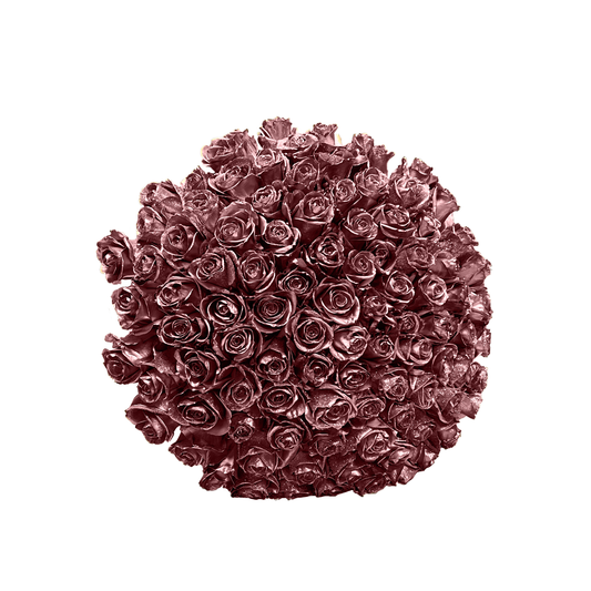 A captivating Rose Gold Bouquet by GiftedFLWR, featuring roses dipped in lustrous tones of rose gold. Meticulously crafted, this exquisite arrangement radiates an aura of love and sophistication. The soft, rosy glow of each rose, combined with lush greenery, forms a harmonious composition perfect for adding a touch of romance to any setting or occasion.